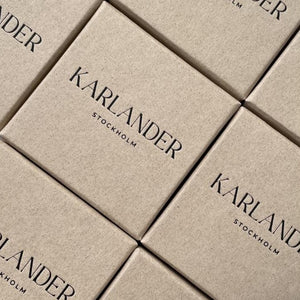 K. Signature studs